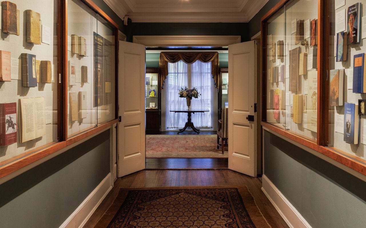 A hallway at the Grolier Club featuring part of Reid Byer's exhibition, "Imaginary Books."
