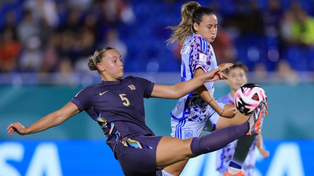 Zara Shaw competes for the ball against Alba Cerrato Zara Shaw competes for the ball against Alba Cerrato