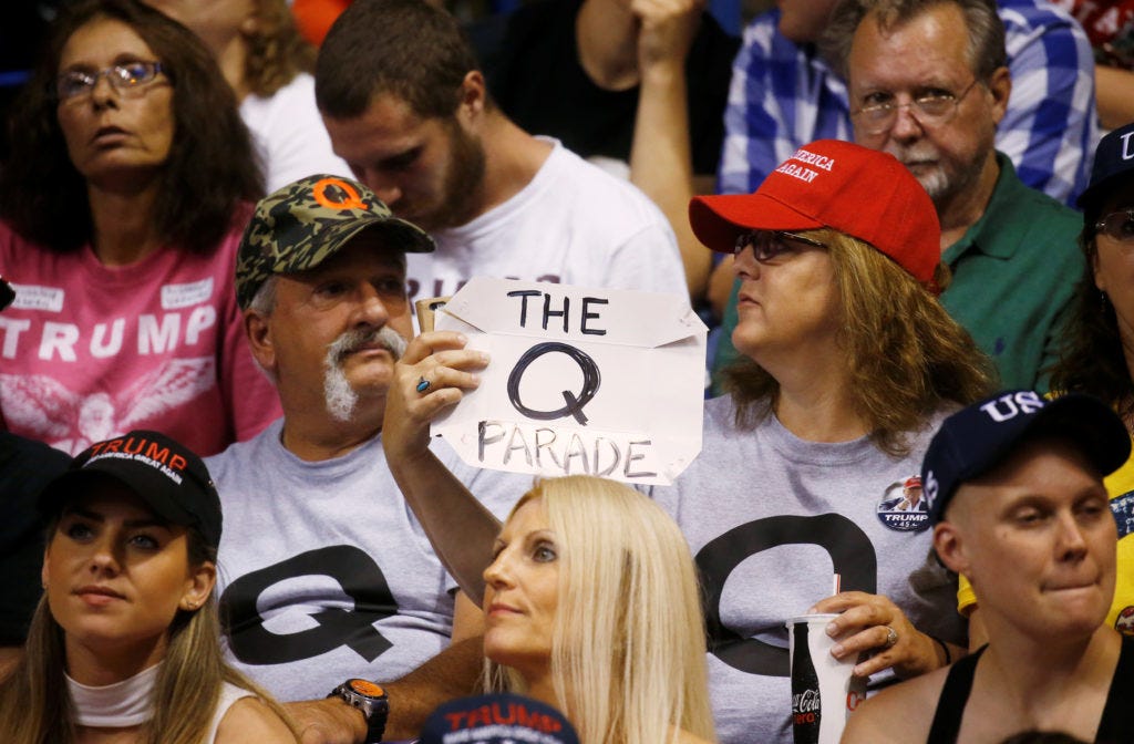 QAnon' conspiracy theory creeps into mainstream politics | PBS News Weekend
