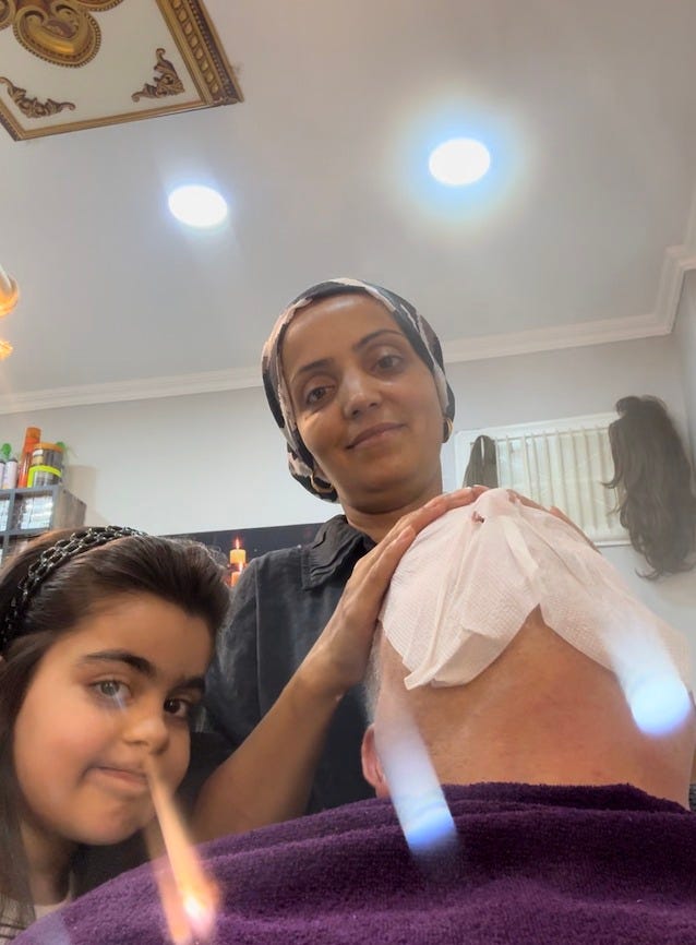 May be an image of 2 people