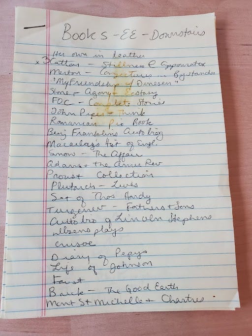 Yellow notepaper covered in messy handwriting.