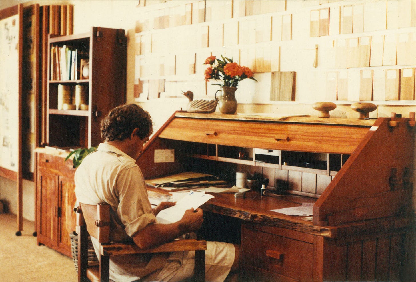 Jeremy Griffith working at a Griffith Tablecraft desk in 1982