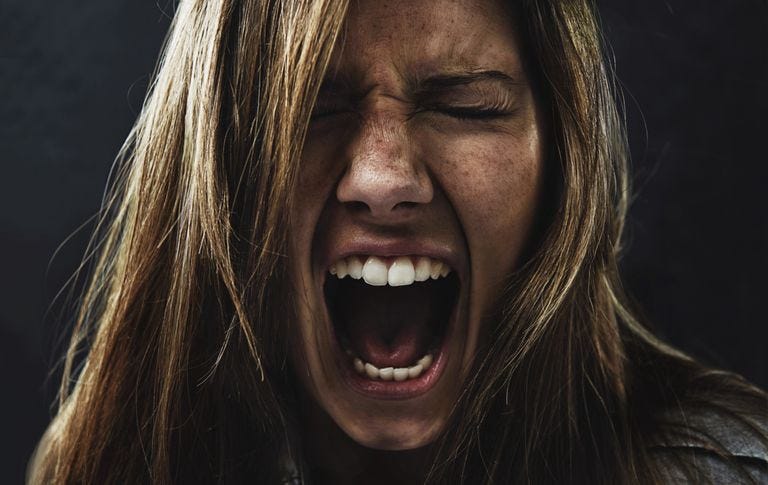 An angry woman. She rightly loathes corporatism.
