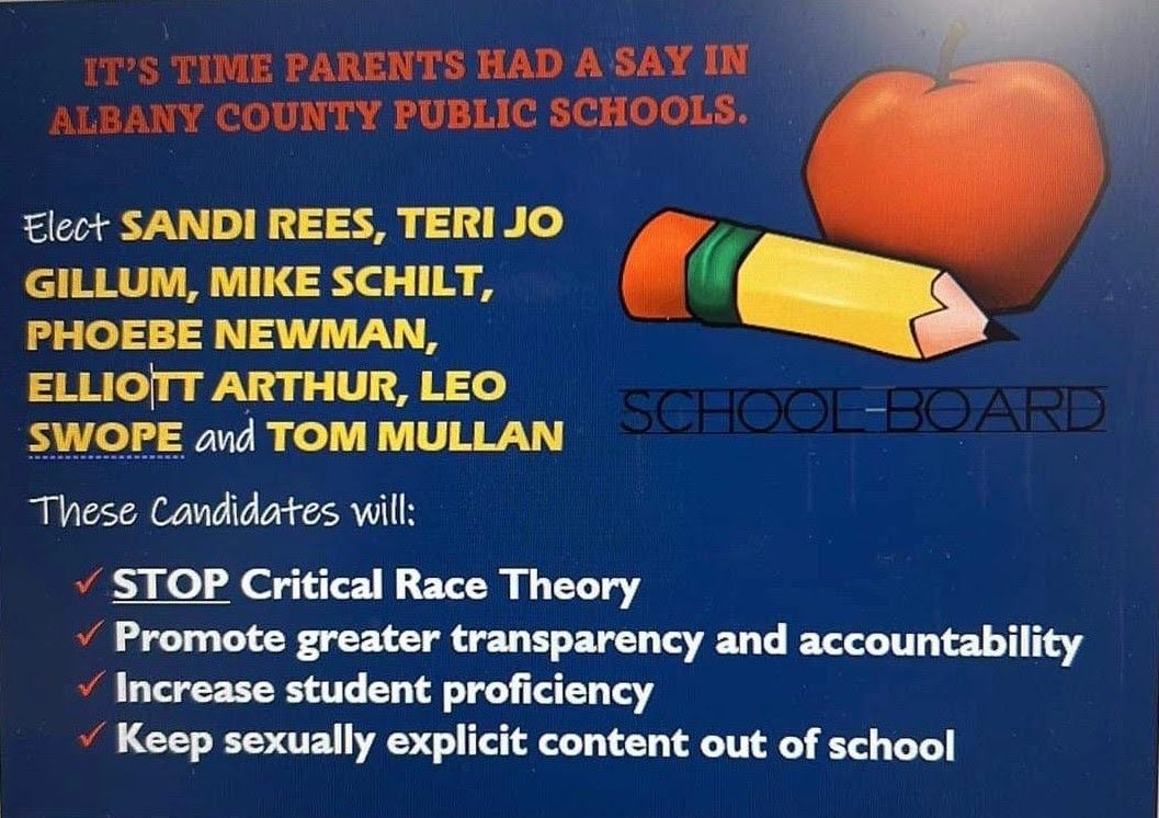 Blue mailer with candidate names and the headline "It's time parents had a say in Albany County Public Schools." Mailer also features clip art of a pencil and apple. Blue mailer with candidate names and the headline "It's time parents had a say in Albany County Public Schools." Mailer also features clip art of a pencil and apple.