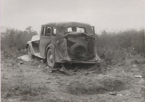 A series of photos showing bomb damage from an accidental detonation. A car is smashed up, there are craters in the ground and the windows of nearby buildings are completely destroyed.
