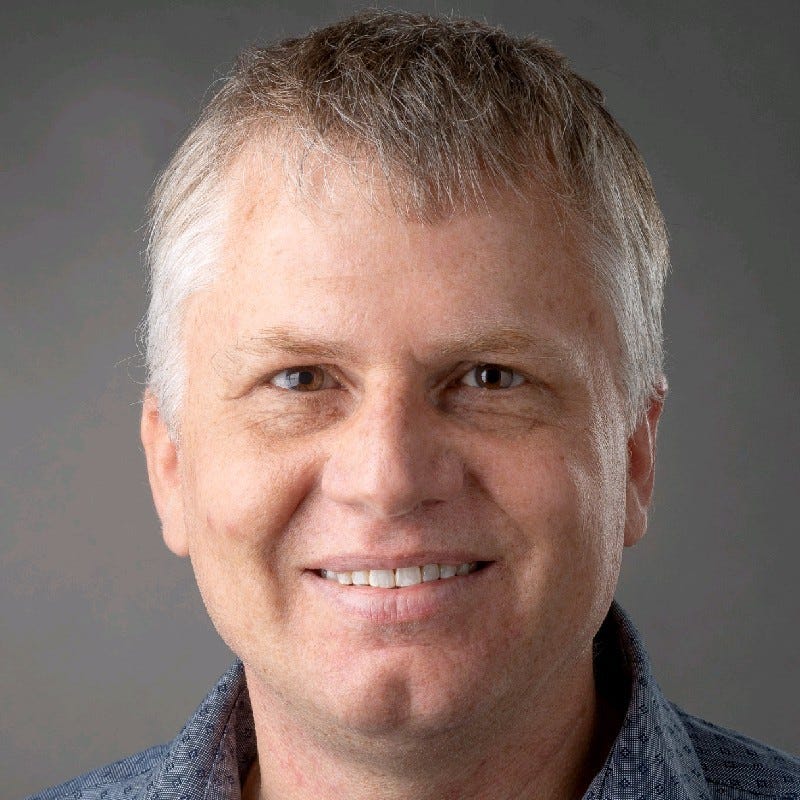 professional headshot of a white male professional headshot of a white male