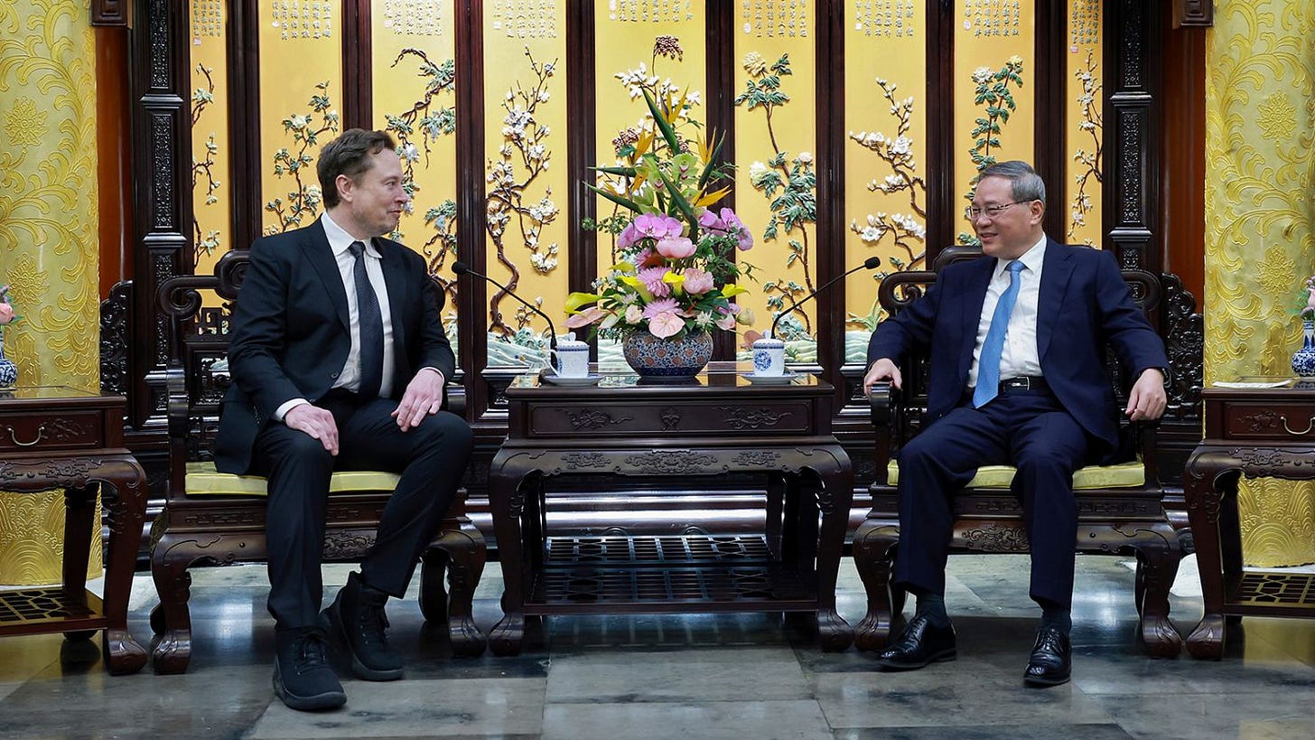 Elon Musk wins official praise for Tesla during surprise visit to China |  CNN Business