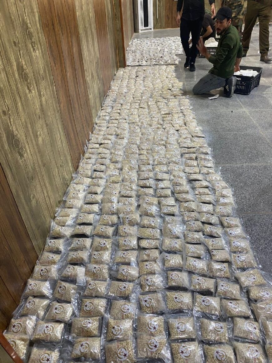 A picture released by the Iraqi border authority on March 11, 2023 shows captagon pills seized at the al-Qaim border crossing with Syria A picture released by the Iraqi border authority on March 11, 2023 shows captagon pills seized at the al-Qaim border crossing with Syria