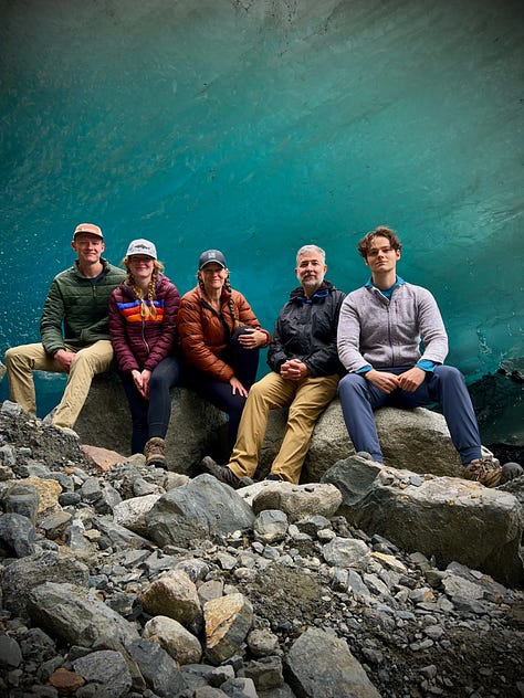 Me as a new father with my daughter, us in Alaska, and my whole family in Alaska