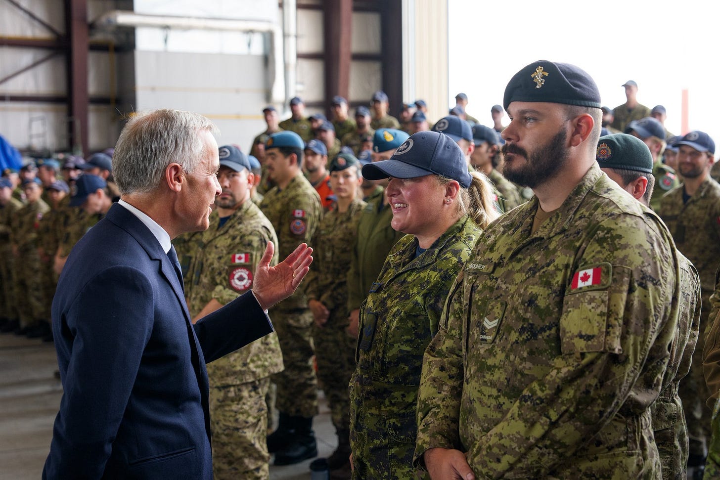 Prime Minister Carney speaks with members of the Canadian Armed Forces in Trenton, Ontario. Prime Minister Carney speaks with members of the Canadian Armed Forces in Trenton, Ontario.
