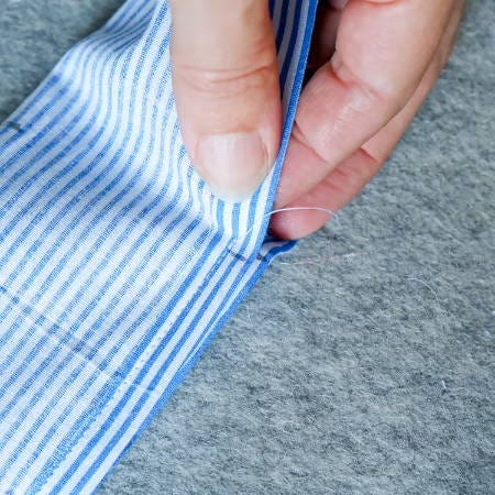 showing where the mark is and the end of the stitching showing where the mark is and the end of the stitching