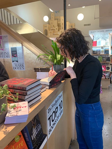 Author Andrea Bartz holding up a copy of THE LOST NIGHT at McNally Jackson books, signing a copy at McNally Jackson, and holding up a page of People Magazine with a review of her book