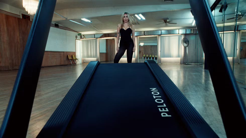 Miley Cyrus on the Peloton Tread Flex in the Let Yourself Run campaign Miley Cyrus on the Peloton Tread Flex in the Let Yourself Run campaign