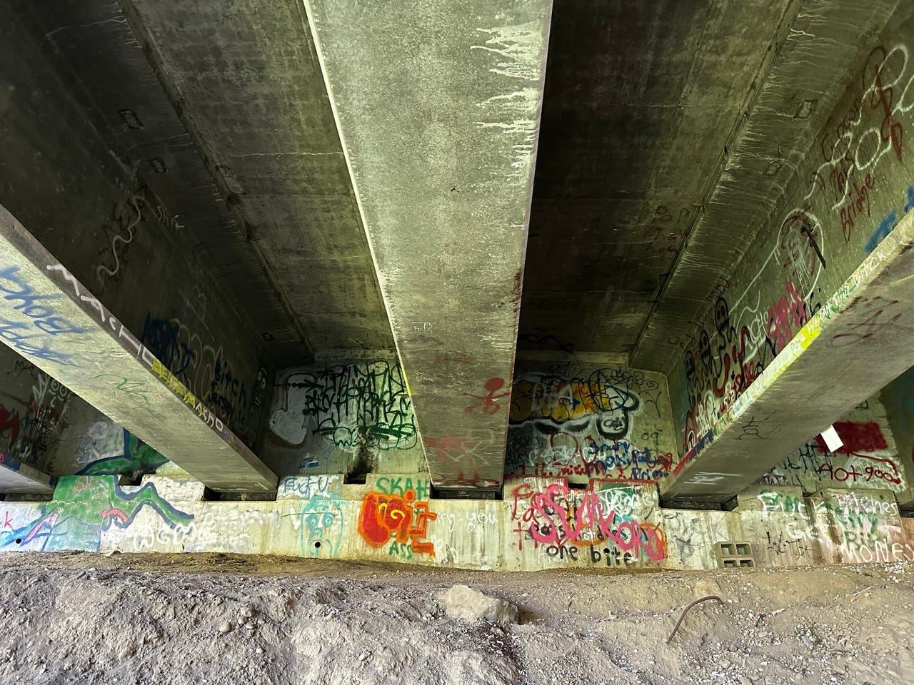 Graffiti on a concrete structure
Description automatically generated Graffiti on a concrete structure
Description automatically generated