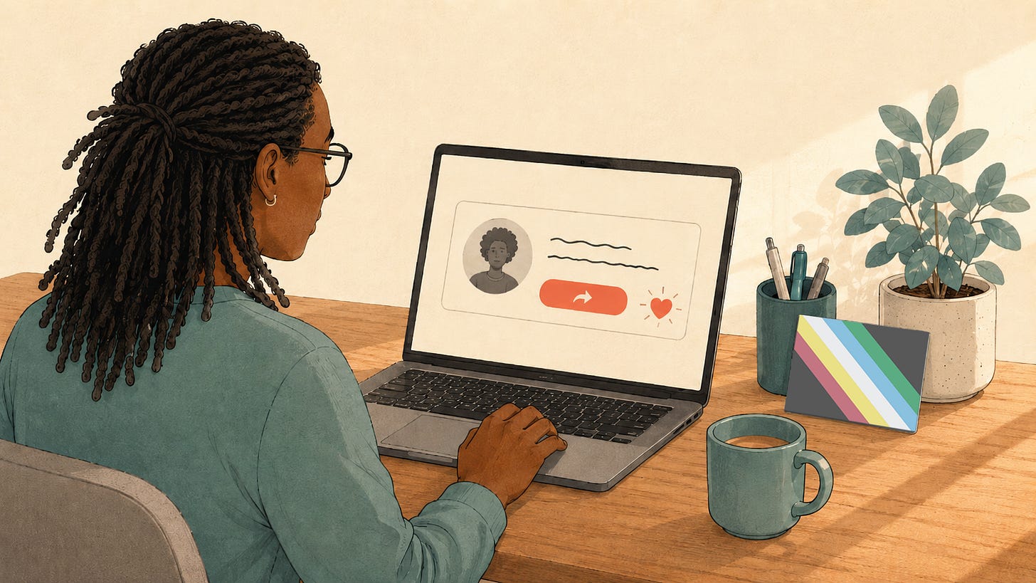 Over-the-shoulder view of a creator at a laptop, sharing another creator's profile online, with a coral share button and heart on the screen. A small Disability Pride Flag, a charcoal field crossed by a diagonal band of five muted stripes, is propped on the desk beside them.