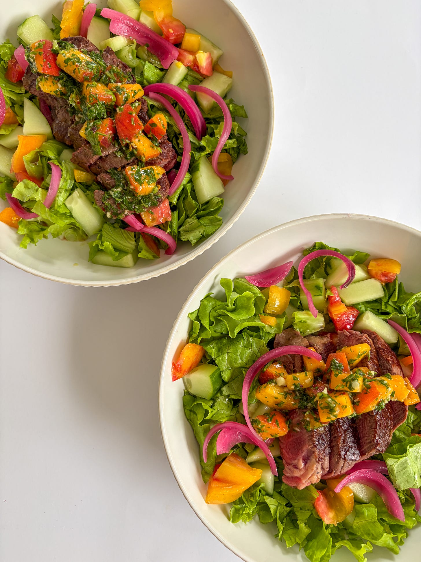 Grilled garlic steak & peach chimichurri salad