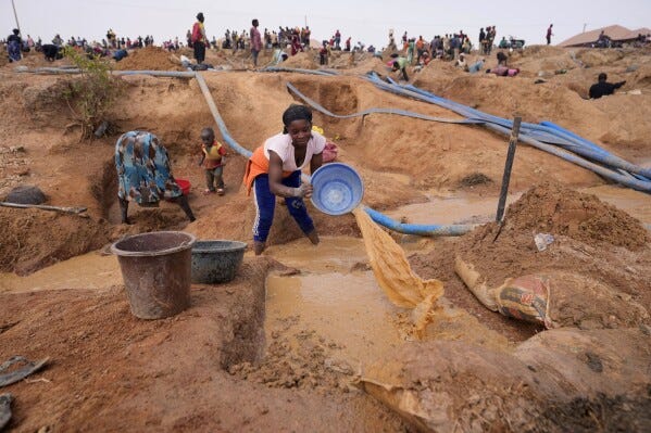 A woman works at an Illegal tin mining site in Jos, Nigeria, Wednesday, April 3, 2024. The recent arrests come as Nigeria seeks to regulate mining of critical minerals, curb illegal activity and better benefit from its mineral resources. (AP Photo/Sunday Alamba) A woman works at an Illegal tin mining site in Jos, Nigeria, Wednesday, April 3, 2024. The recent arrests come as Nigeria seeks to regulate mining of critical minerals, curb illegal activity and better benefit from its mineral resources. (AP Photo/Sunday Alamba)
