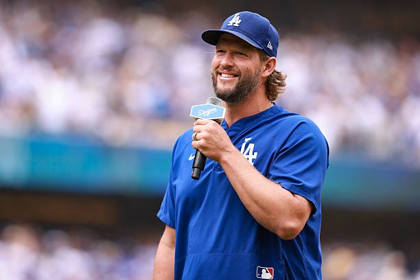 Clayton Kershaw of the Los Angeles Dodgers addresses fans prior to the game between the San Francisco Giants and the Los Angeles Dodgers at Dodger...