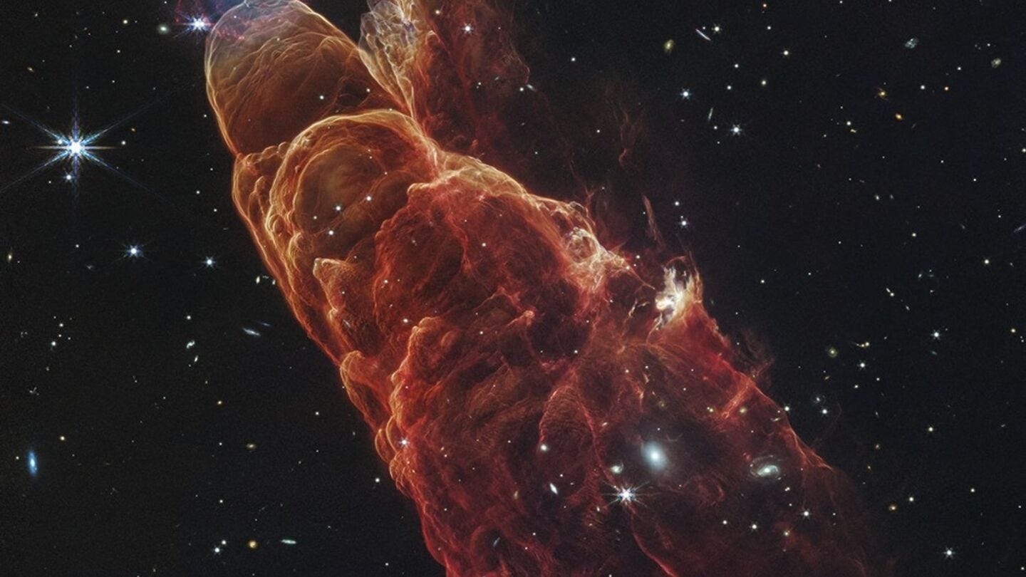 Webb Space Telescope captures a star in the making and a galaxy far, far  away | AP News