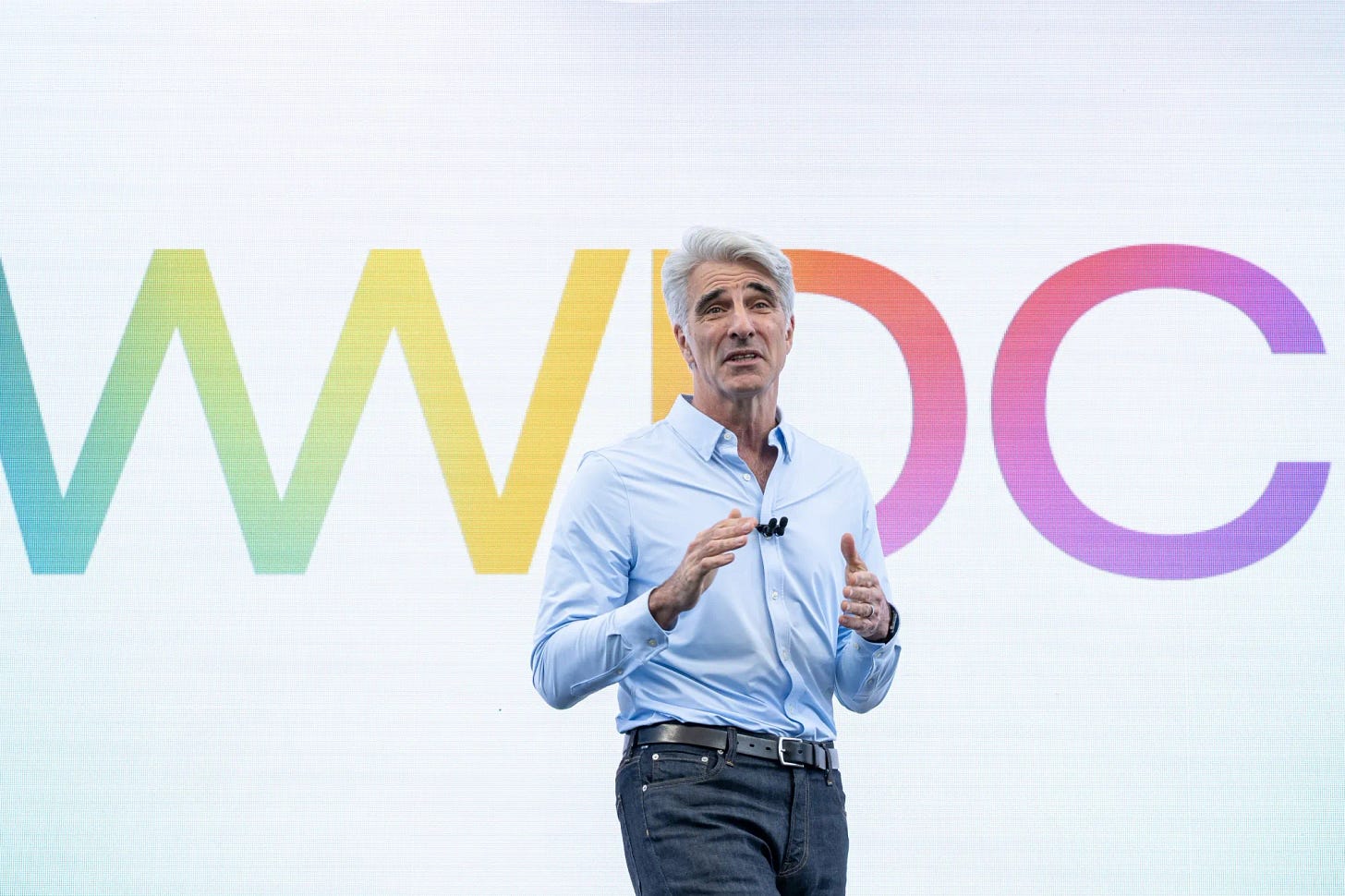 Apple software head Craig Federighi, shown at the Worldwide Developers Conference in June, is considering whether the company should expand its use of outside AI technology.