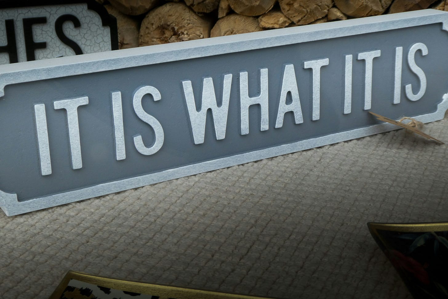 a sign that states: It is what it is a sign that states: It is what it is