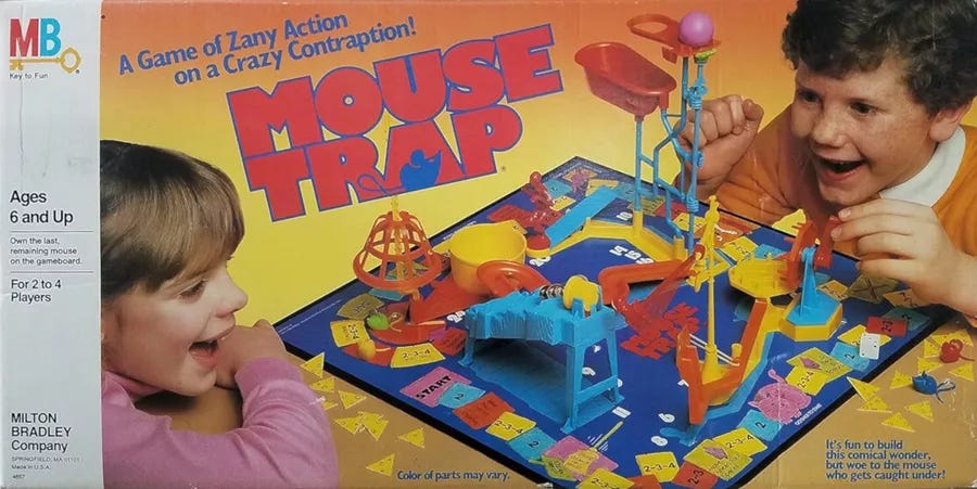 A classic cover for the board game Mouse Trap with the contraption of plastic in the center of a board and excited children playing.
