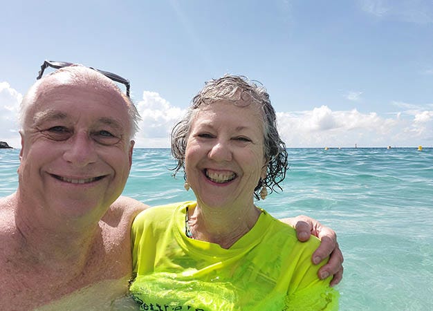 Senior couple in the ocean at Shell Beach, Gustavia, St. Barth