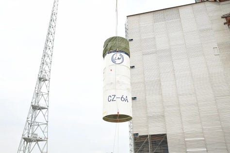 The Long March 6A's first-stage, second-stage, and fairing being brought to Launch Complex 9A ahead of its July 4th 2026 mission.