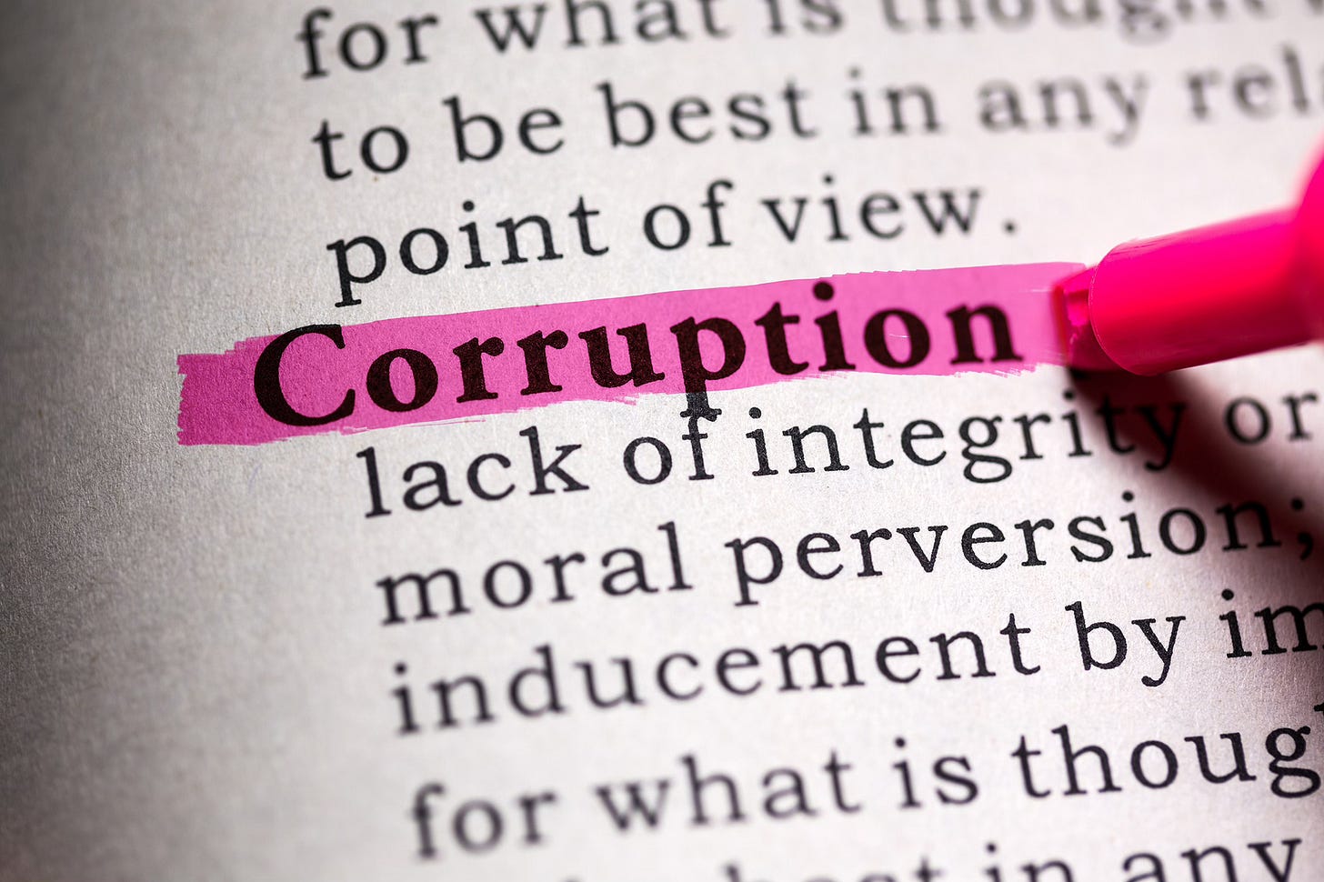 Image of the definition of Corruption with that word highlighted in hot pink Image of the definition of Corruption with that word highlighted in hot pink