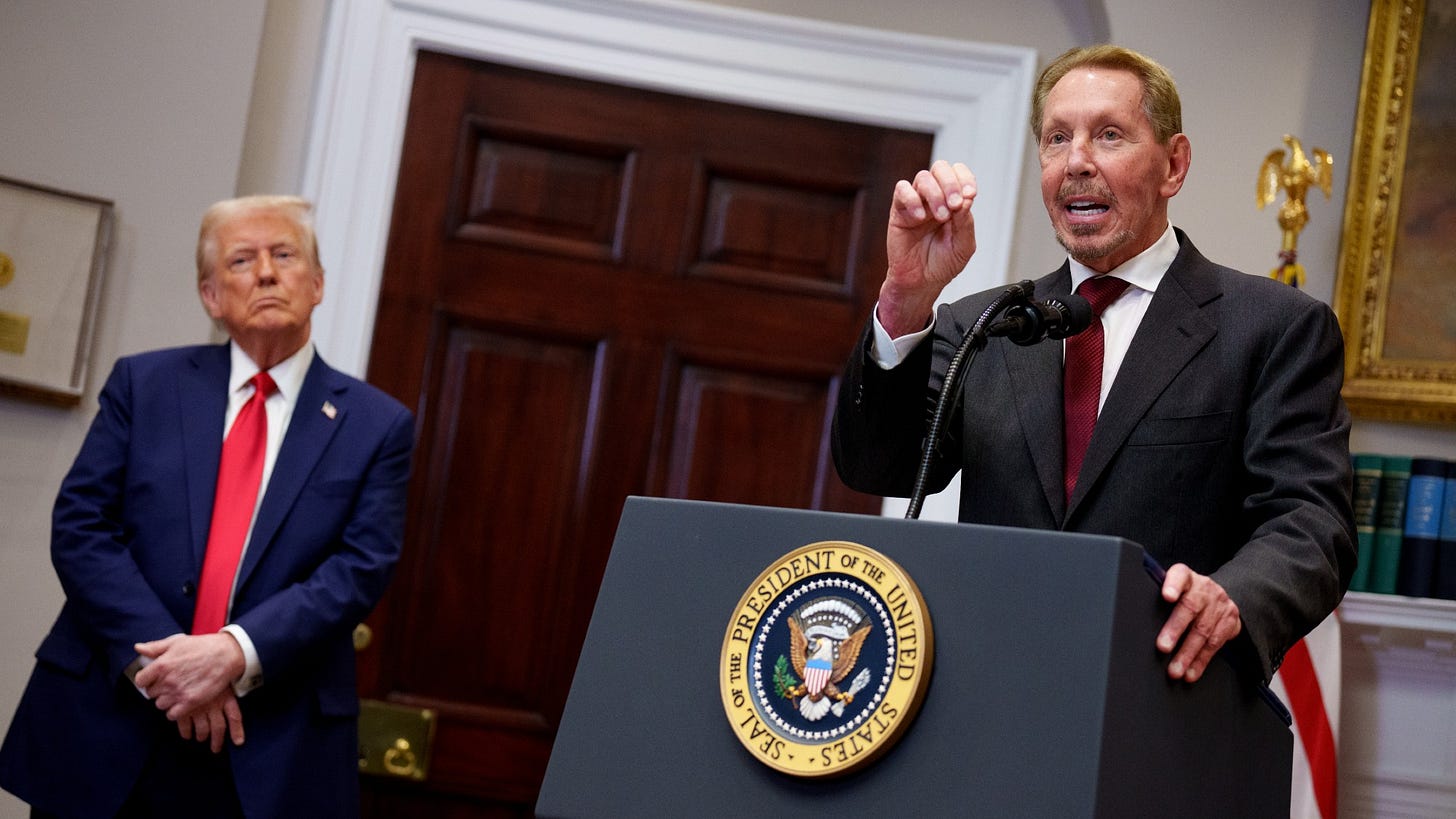 Larry Ellison speaks at a podium in the Roosevelt Room of the White House, while Donald Trump looks on Larry Ellison speaks at a podium in the Roosevelt Room of the White House, while Donald Trump looks on
