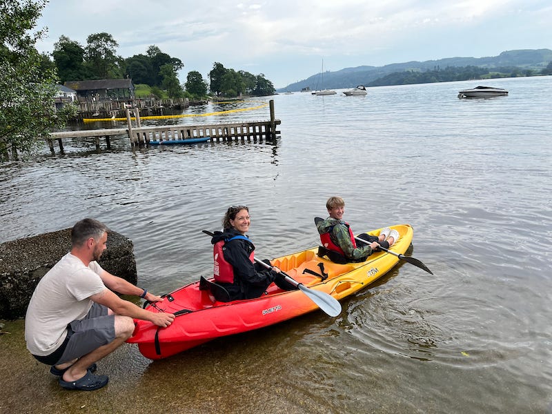 2025-6-21 Becky and Hudson in a kayak Lake District England, Photo by author
