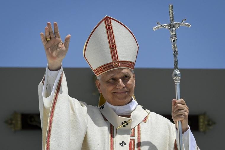 Pope Leo XIV waves to crowds during Mass at the Port of Santa Cruz in Tenerife, Spain, June 12, 2026.