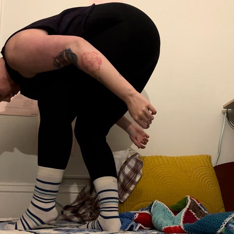 video stills of a person seated on the floor in motion