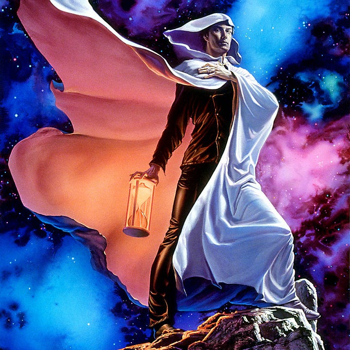 LEFT: Figure detail from CHRONOS featuring a man in a hooded white cloak over black leather jacket and trousers standing against a cosmic backdrop of pink, blue, and purple. He holds an hourglass glowing orange with sand filling the upper chamber. RIGHT: Close detail from CHRONOS featuring a man in hooded white cloak with one hand over his chest. He casts his eyes down to the viewer in a low angled POV. On his finger, he wears a signet ring. In his other hand, he grips the top of an hourglass that glows peach against his cloak. His clothes are simple in design down to the off-center buttons that wrap his jacket closed.