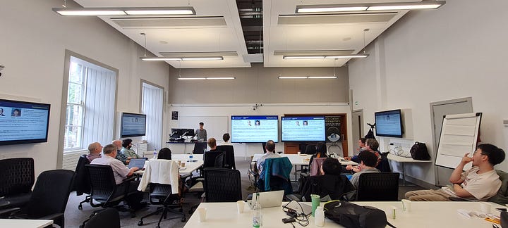 Five photographs of workshop attendees around tables in discussion, and a collage of speakers in front of presentations