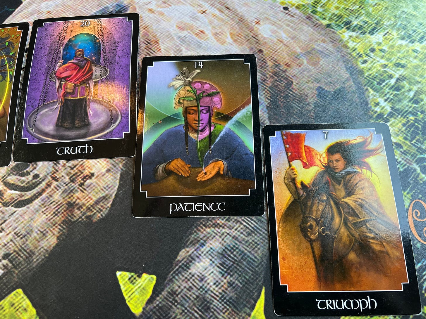 Three cards pulled from John Holland's Psychic Tarot deck