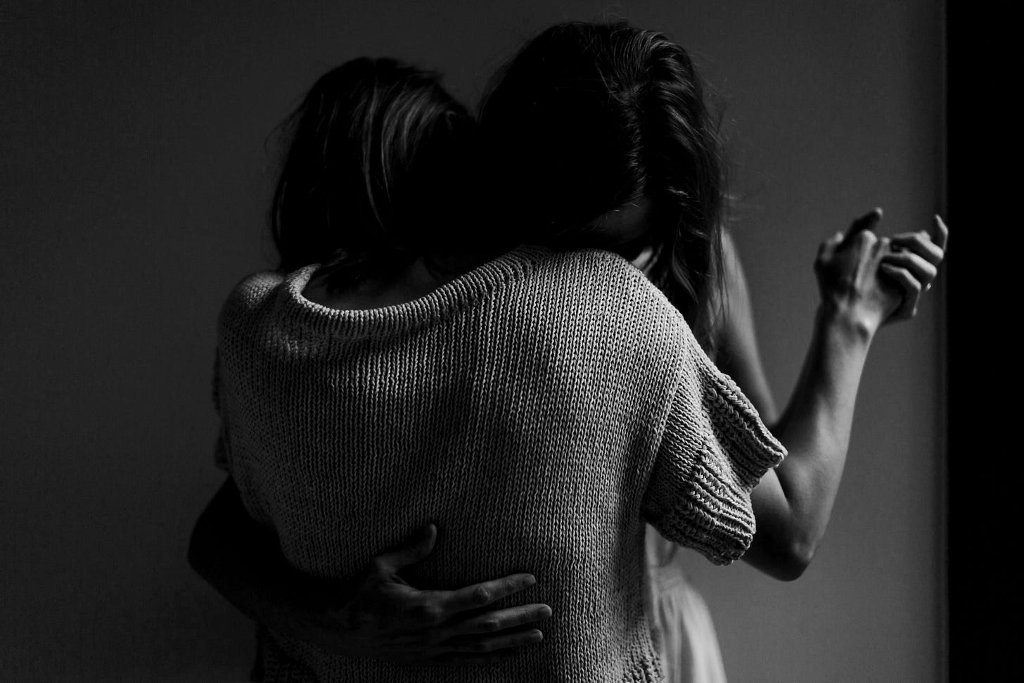 two women hugging each other two women hugging each other