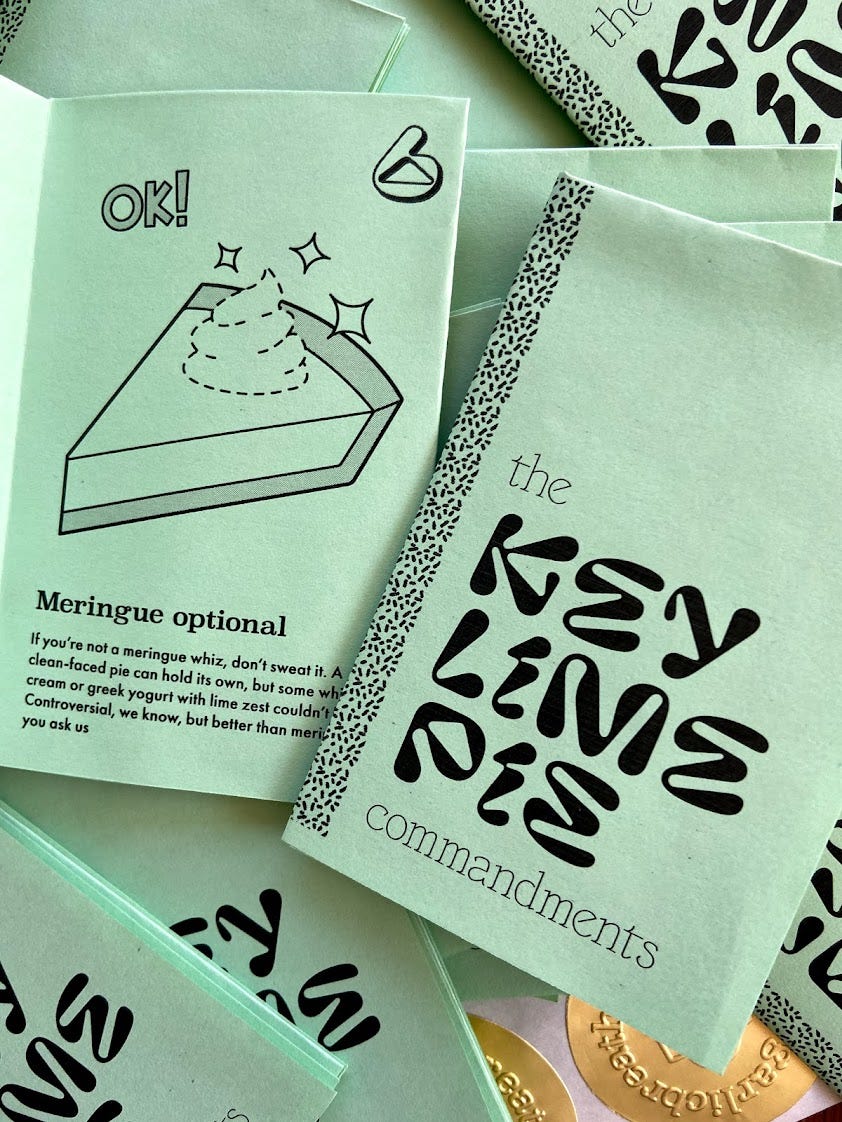 a stack of key lime pie zines, some open previewing content