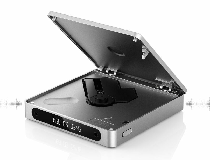 A sleek, open aluminum Fiio DM13 CD player with a digital display showing "1:68 75 02:40," displaying the internal CD mechanism. The background features a soundwave graphic.