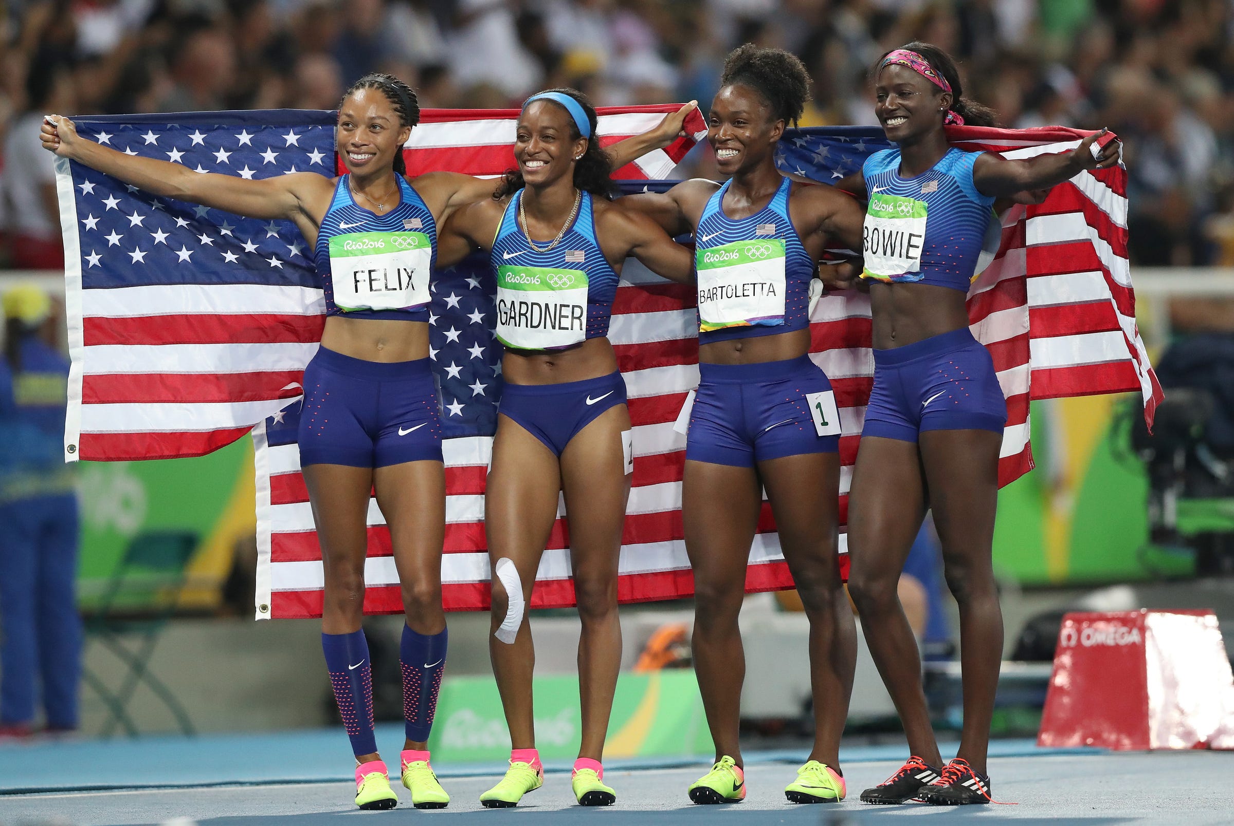 The United States team from left, Allyson Felix, English Gardner, Tianna Bartoletta and Tori Bowie celebrate winning the gold medal in the women's 4x100-meter relay final during the athletics competitions of the 2016 Summer Olympics at the Olympic stadium in Rio de Janeiro, Brazil, Friday, Aug. 19, 2016. (AP Photo/Lee Jin-man) The United States team from left, Allyson Felix, English Gardner, Tianna Bartoletta and Tori Bowie celebrate winning the gold medal in the women's 4x100-meter relay final during the athletics competitions of the 2016 Summer Olympics at the Olympic stadium in Rio de Janeiro, Brazil, Friday, Aug. 19, 2016. (AP Photo/Lee Jin-man)