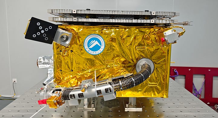 The Yuxing-3-06 spacecraft in a clean room ahead of delivery to ExPace, with its refueling arm stowed at the front.