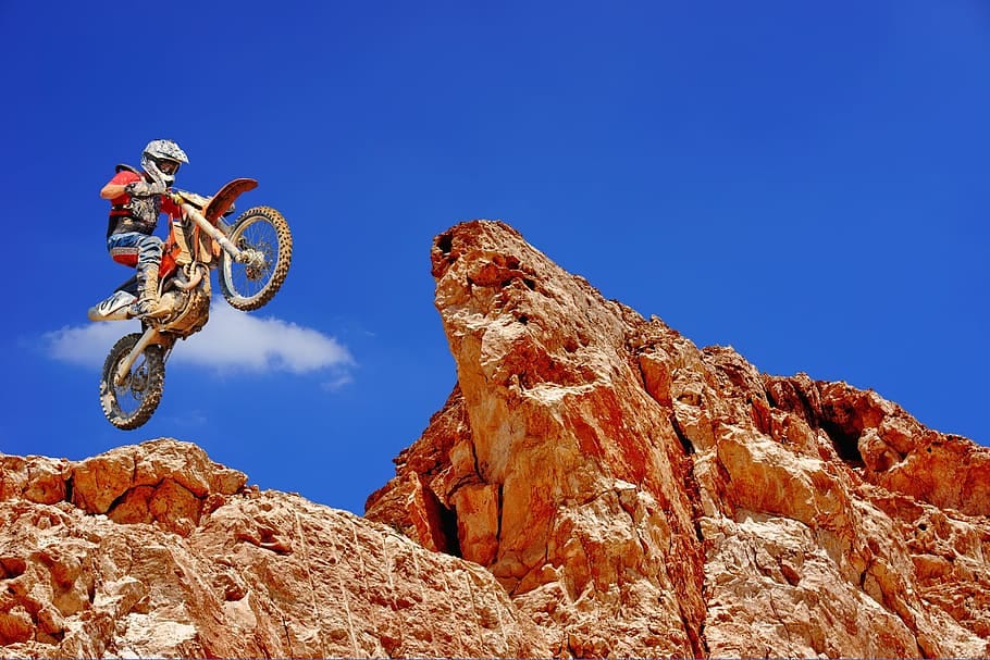 HD wallpaper: person on dirt bike jumping off from cliff, motocross ...