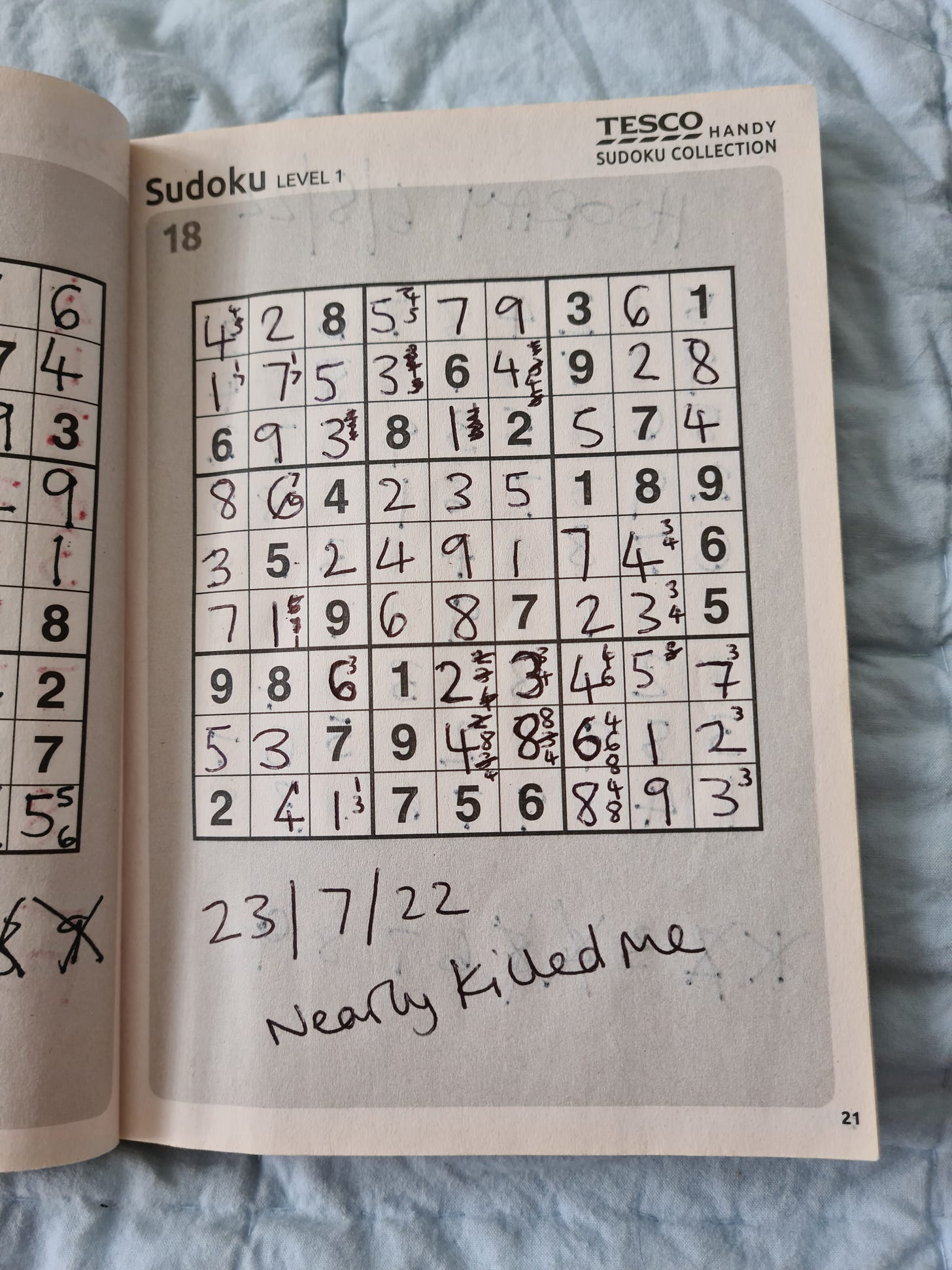 A Tesco SUDOKU puzzle book variously completed by our dad and then KV after his death.