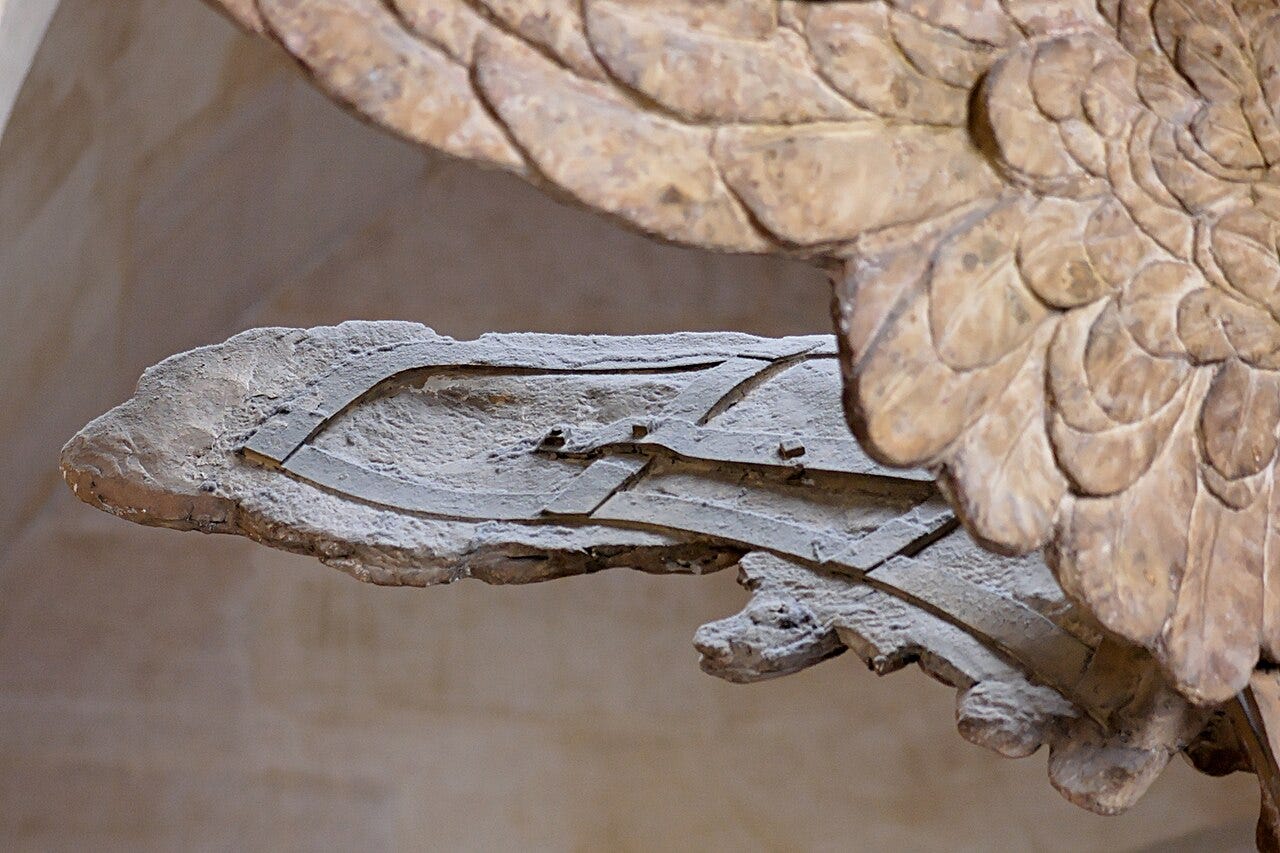 Winged Nike striding on a ship prow, wet drapery Winged Nike striding on a ship prow, wet drapery