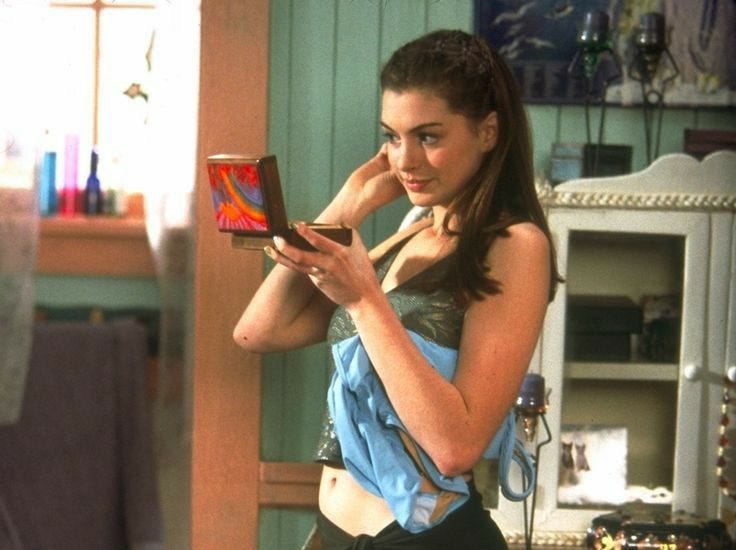 This may contain: a woman is holding a tablet and talking on the phone