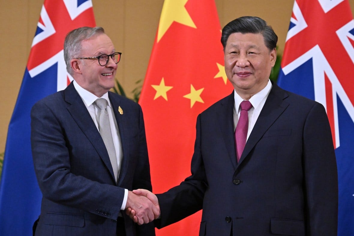 Anthony Albanese and Xi Jinping shaking hands at the G20 Summit.