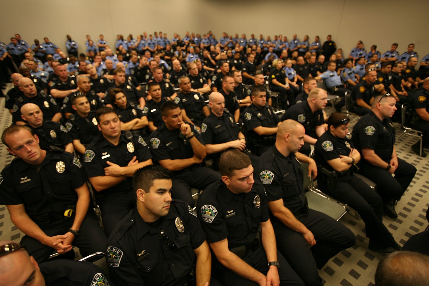 Room full of police officers Room full of police officers