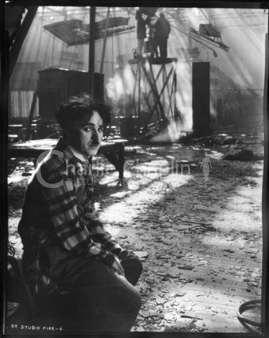 Chaplin on the set of The Circus after a fire raged through the studio during the ninth month of shooting, destroying sets and props. Chaplin on the set of The Circus after a fire raged through the studio during the ninth month of shooting, destroying sets and props.