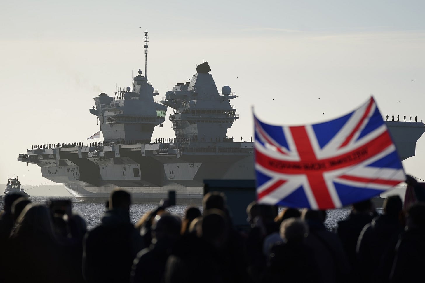Families and friends welcome aircraft carrier HMS Prince of Wales home | The Independent Families and friends welcome aircraft carrier HMS Prince of Wales home | The Independent
