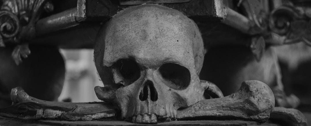 grayscale photo of man wearing sunglasses